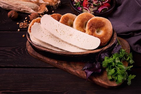 Mchadi, corn tortillas, traditional Georgian dish, corn bread, with Imeretian cheese, homemade, no