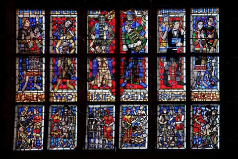 Colourful stained glass window with inscription Cain where is your brother Abel, Genesis 4, 9,