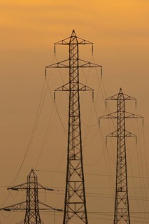 Electricity pylons silhouette at sunset, Kent, England, United Kingdom, Europe