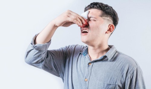 Man suffering from sinusitis isolated. People suffering with irritated nose isolated. Concept of