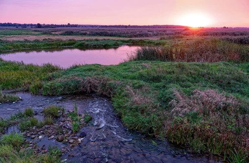 Sunrise over the meandering riverbed of the Narew and the Narew National Park, Narwianski Park
