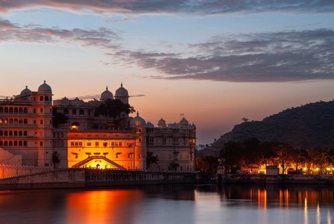 Illuminated city palace, Maharana or Maharaja of Udaipur, Lake Pichola, Udaipur, Rajasthan, India,