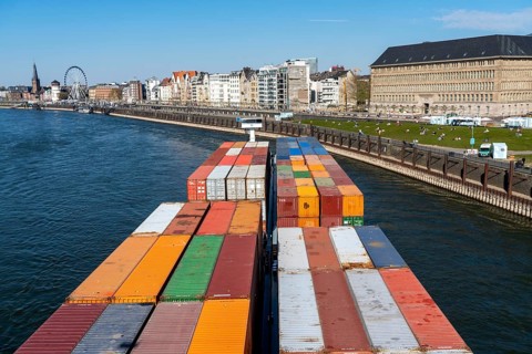 Container freighter, Milliennium II, as a coupled convoy, on the Rhine, on the right the North