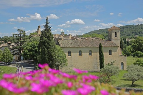 Temple, church, floral decoration and townscape of Lourmarin, Luberon, Vaucluse, Provence, France,