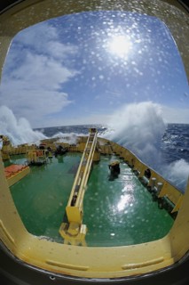 Bullseye with sunb look to bow of Icebreaker Kapitan Khlebnikov in rough seas at the way to