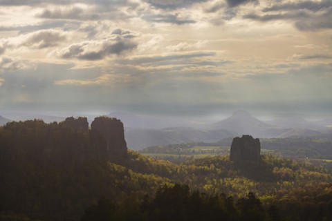 View of the Schrammstein chain, the Falkenstein and the Lilienstein from the Carolafelsen, Bad