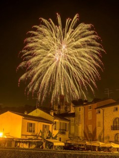Fireworks from the Scaliger castle in the foreground Houses of, Borghetto, Valeggio sul Mincio,