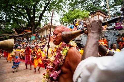 GUWAHATI, INDIA, AUGUST 19: Priests dance in the beat of Dhol (Drum) during the annual