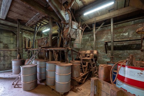 Metal barrels in the bronze powder filling room of a metal powder mill, founded in 1900, Igensdorf,