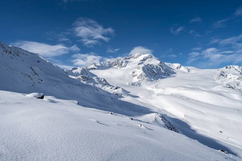 Snow-covered mountain landscape, mountain peak Monte Cevedale and glacier Zufallferner and