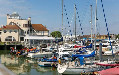 Yachts at moorings in harbour of Royal Norfolk and Suffolk yacht Club, Lowestoft, Suffolk, England,