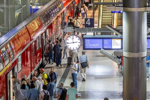 Platform with passengers, Gesundbrunnen station with Deutsche Bahn AG regional train. Berlin,