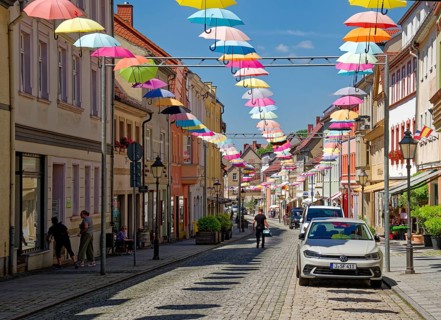 Colourful umbrellas as city decoration, old town of Eisenberg, Saale-Holzland district, Thuringia,