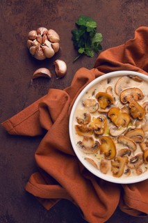 Mushrooms in creamy garlic sauce, with herbs and spices, gravy, sauce, no people
