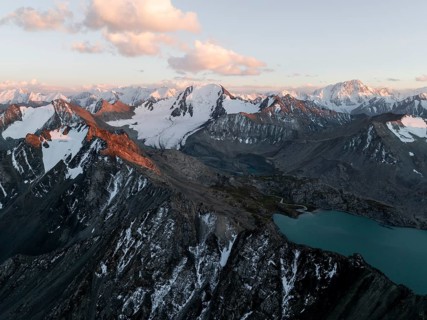 Evening mood, mountain panorama, aerial view, 4000 metre peak with glacier, mountain pass and