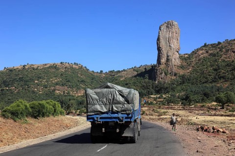 Amhara region, stele-like vulture rock near the town of Gondar, country road, Ethiopia, Africa