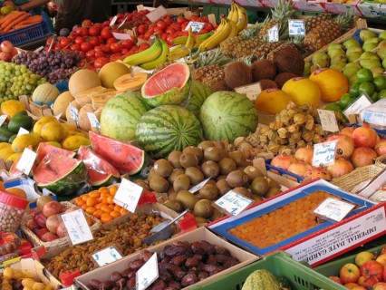 Market stall with different types of fruit and vegetables