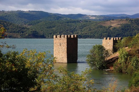 Wallachia, view of the Danube landscape, two towers, remains of the medieval fortress Trikule near
