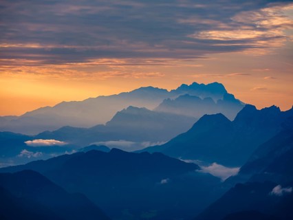 Silhouette of the Hoher Dachstein in the haze at dawn, Roßfeld, Golling, Salzburg province,