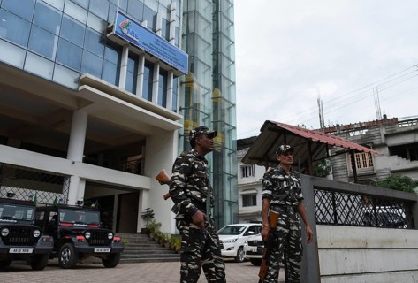 Security personnel in front of the NRC office on July 29, 2018 at Bhangagarh in Guwahati, Assam,
