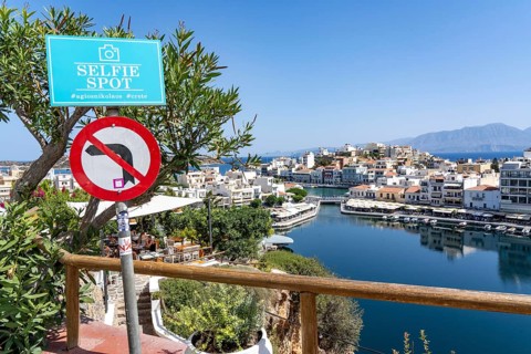 Sylvie Spot above the village of Agios Nikolaos, in the eastern part of Crete, view over Lake
