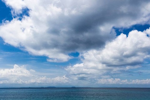 Sky with beautiful clouds over the sea in the marine reserve. Malaysia