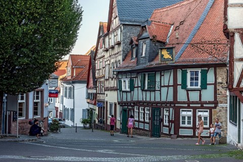 Historic medieval half-timbered houses, row of houses, pedestrian zone, play street, small square