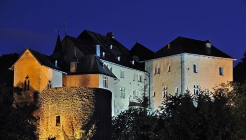 The Bourglinster Castle illuminated at night, Luxembourg, Europe