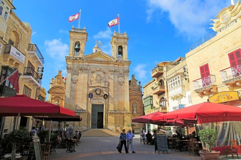 Basilica church and cafes in Saint George's square, Plaza San Gorg, Victoria Rabat, island of Gozo,