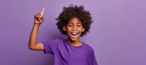 Young attractive black male pointing finger at copy space. Promo and advertisement discount