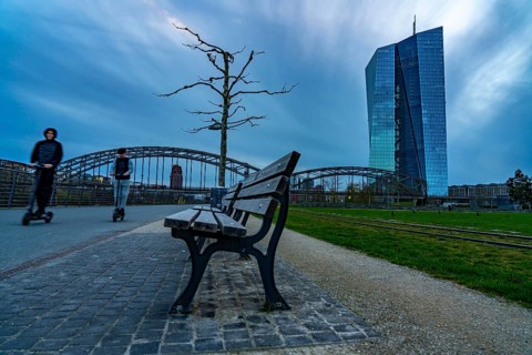 Building of the European Central Bank, ECB, on the Main in Frankfurt, park bench on the banks of
