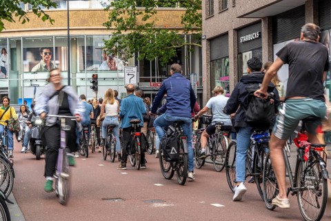 Central cycle path on Lange Viestraat, in the city centre of Utrecht, lanes for pedestrians,