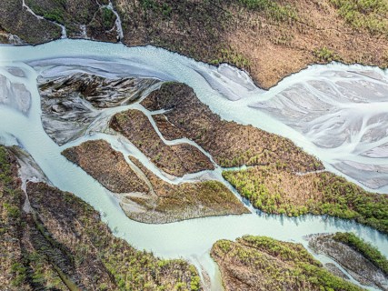 The widely branching arms of river Jostedalsola, a glacial river originating in the Jostedalsbreen