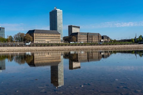 Skyline of houses on the banks of the Rhine in Düsseldorf's old town, Vodafone tower block, North