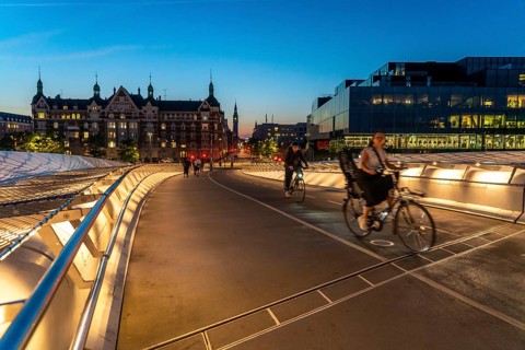Cyclists on the Lille Langebro cycle and pedestrian bridge over the harbour, Copenhagen is