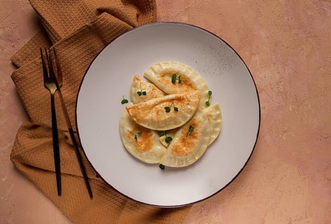 Pierogi, a traditional dish of Polish cuisine, dumplings, top view, close-up, no people