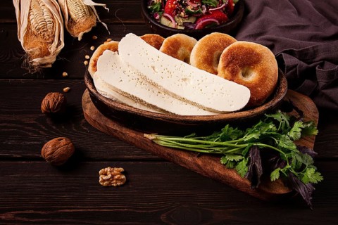 Mchadi, corn tortillas, traditional Georgian dish, corn bread, with Imeretian cheese, homemade, no