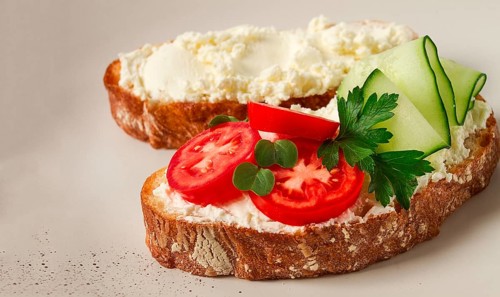 Sandwich, with cream cheese, homemade, on a cutting board, rustic style, no people, selective