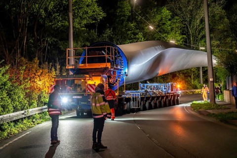 Transport of a 68 metre long, 22 tonne blade of a wind turbine, here in Schwelm, with a