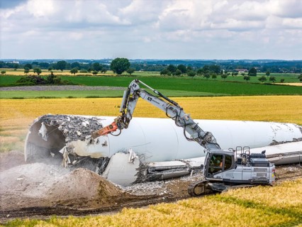 Demolished tower of a 20 year old wind turbine, in the Werl wind farm, 5 old Enercon E-66 turbines
