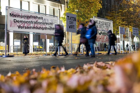 Between signs painted by children, former banners were set up on Zimmerstraße between the
