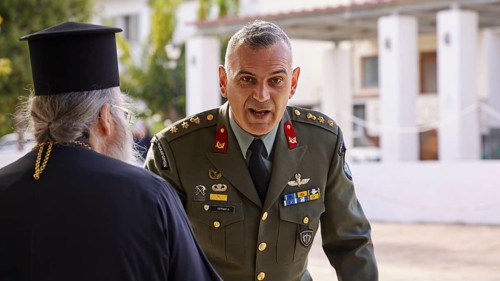 Greek soldier in uniform talks to Archbishop Amphilochios in the open air, Visit of Federal