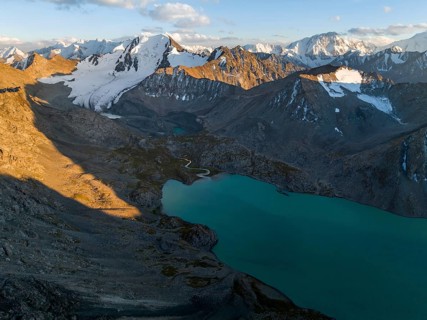 Evening mood, mountain panorama, aerial view, 4000 metre peak with glacier, mountain pass and