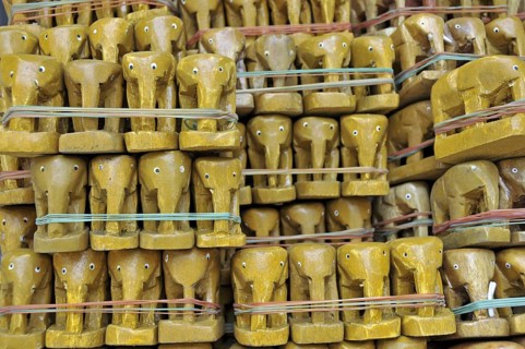 Small teak elephants, Erawan Shrine, Bangkok, Thailand, Asia