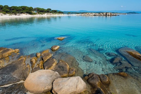 Quiet coast with turquoise water and rocky beach, Karidi beach, Karydi, Vourvourou, Sithonia,