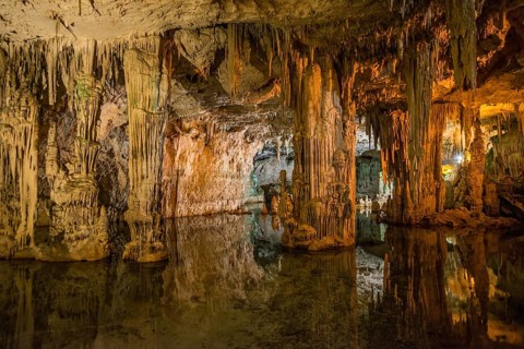 Huge stalactites and underground lake, stalactite cave, Grotta di Nettuno, Neptune Grotto, Capo