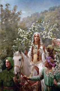 A woman in medieval dress rides a white horse holding flowering branches, surrounded by people in
