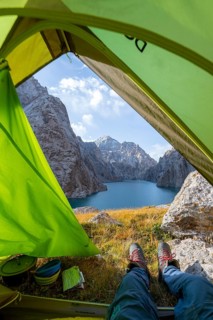 Wild camping, camping in the wilderness with a tent, Kol Suu mountain lake, Sary Beles Mountains,