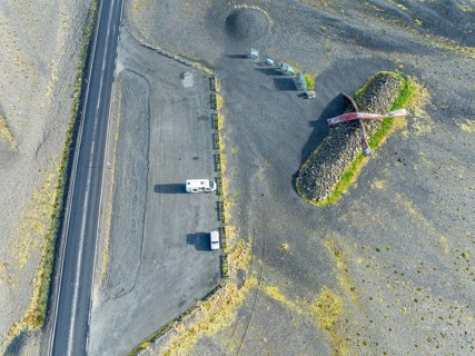 Aerial view of the Skeidara Bridge Monument viewpoint, large metal parts of the bridge that was