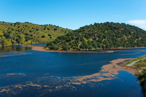 Expansive lake surrounded by wooded hills and clear skies, reservoir, Tagus River, Tagus River,